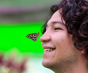 Man with butterfly on his nose